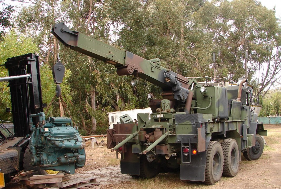 M936 installing Detroit Boat Engine.JPG