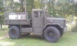 PLS WHEELS WITH MRAP ADAPTERS ON PATRACY TRUCK 2.jpg